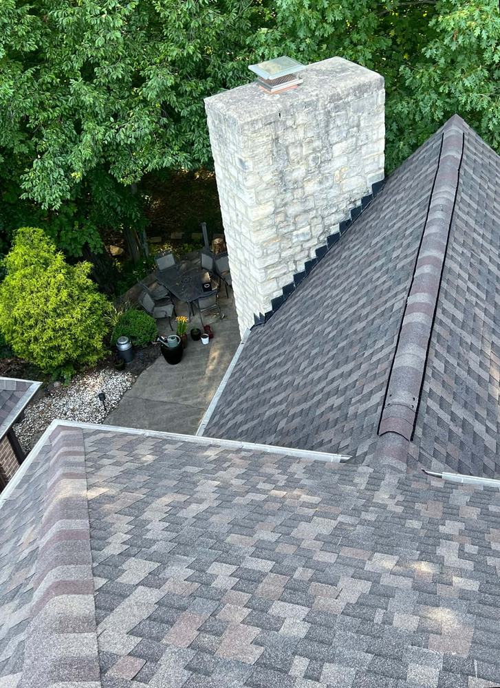 Shingle valley worked around a stone chimney